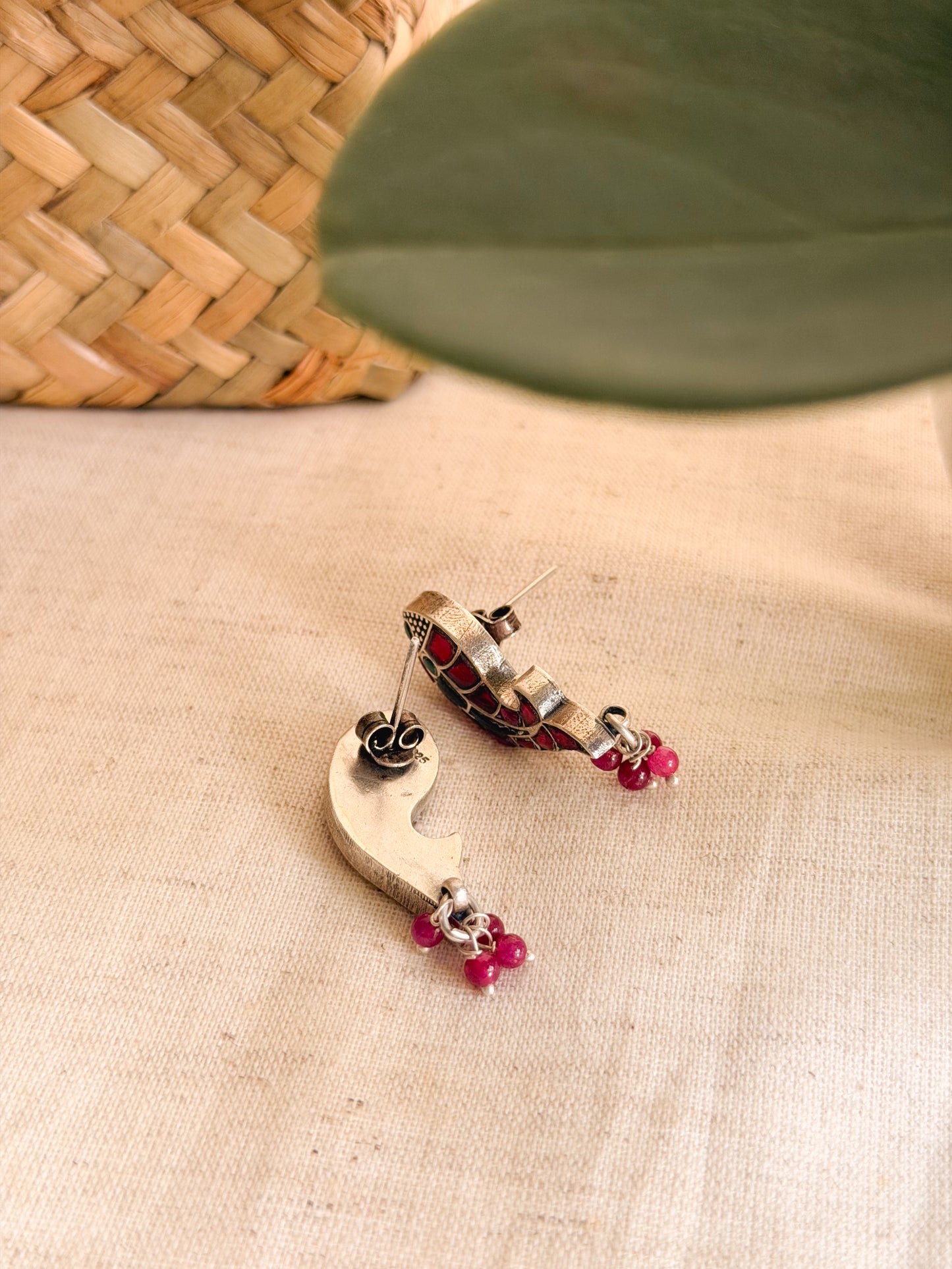 Meen studs in kundan carved in silver