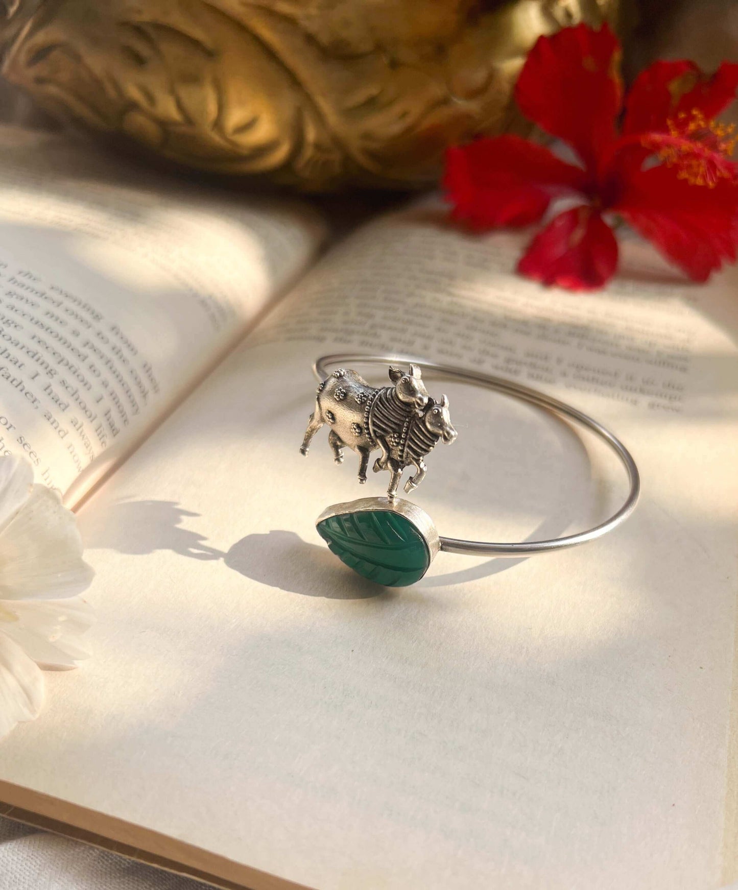 Kamadhenu kada in silver with green quartz stone