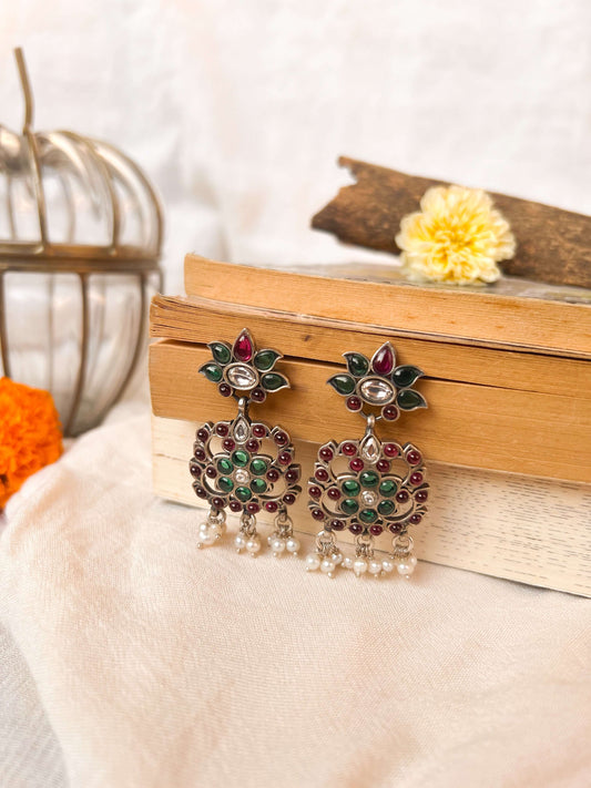Gunjan earrings with emerald green and ruby onyx kundan details