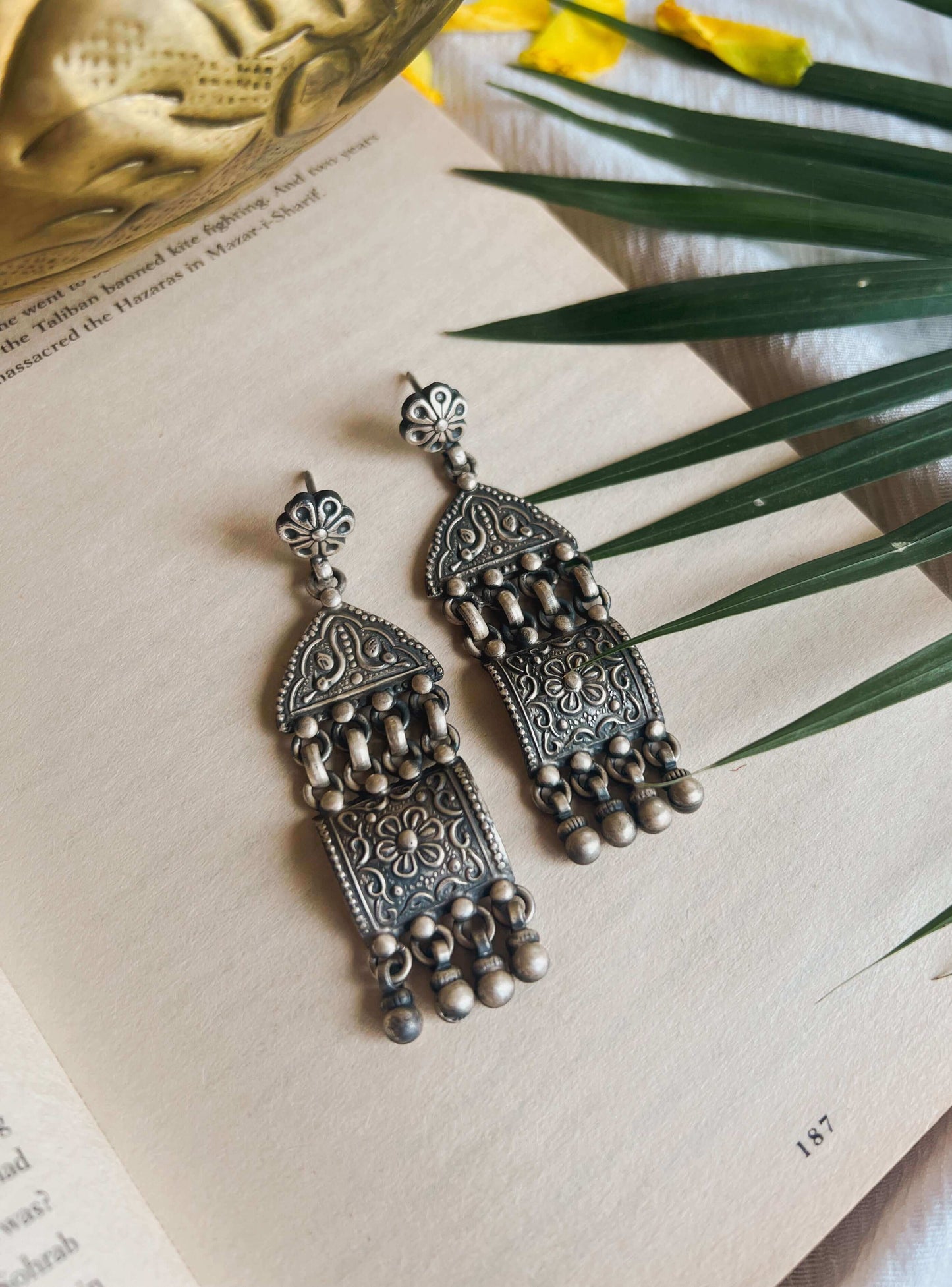 Aditri silver danglers with carved detail and silver beads