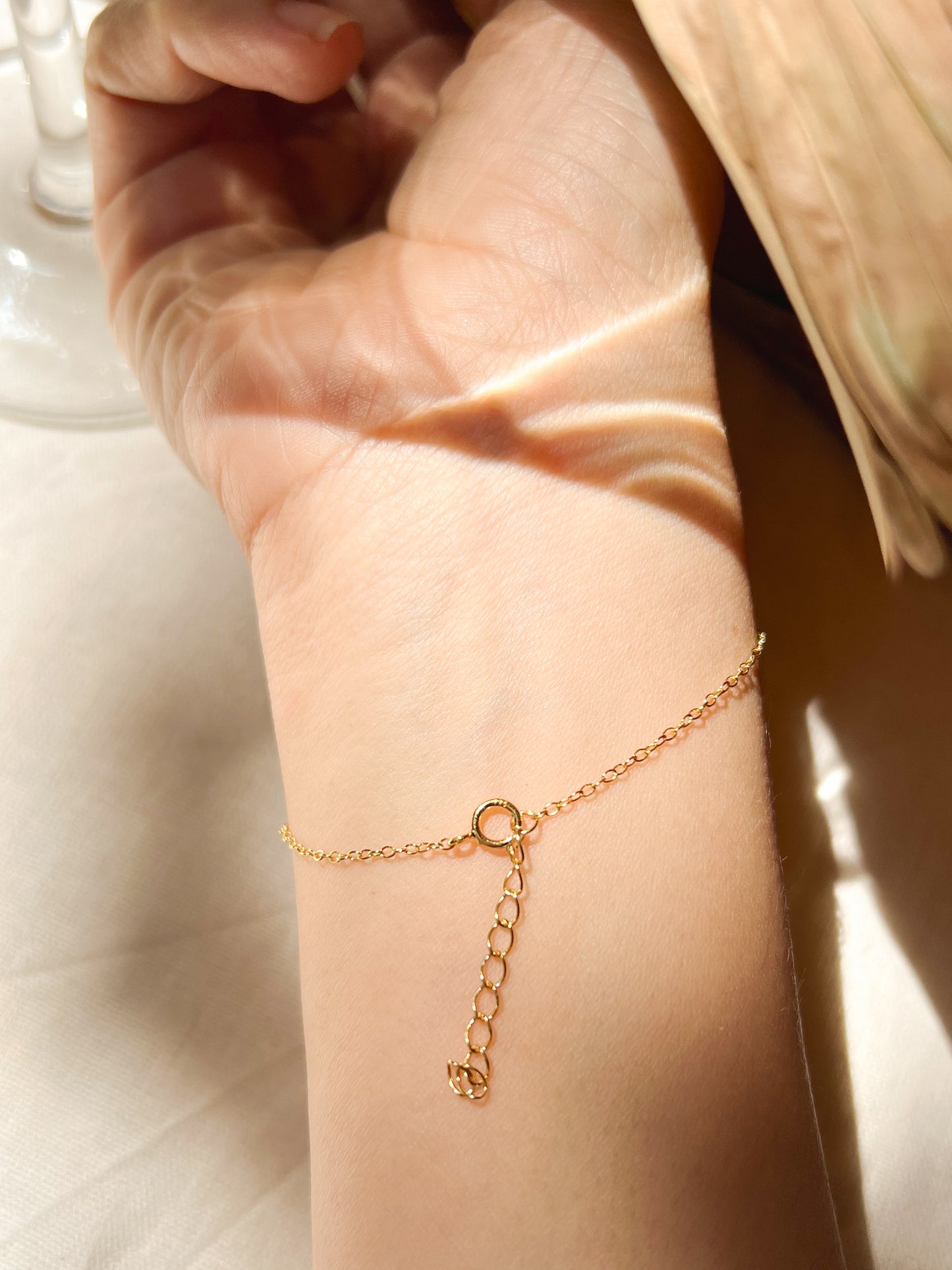 Tristar 18k gold plated hand chain with studded zircon in sterling silver