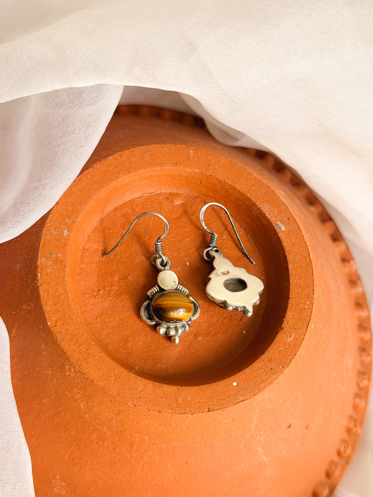 Ruha fish hooks with tiger eye stone