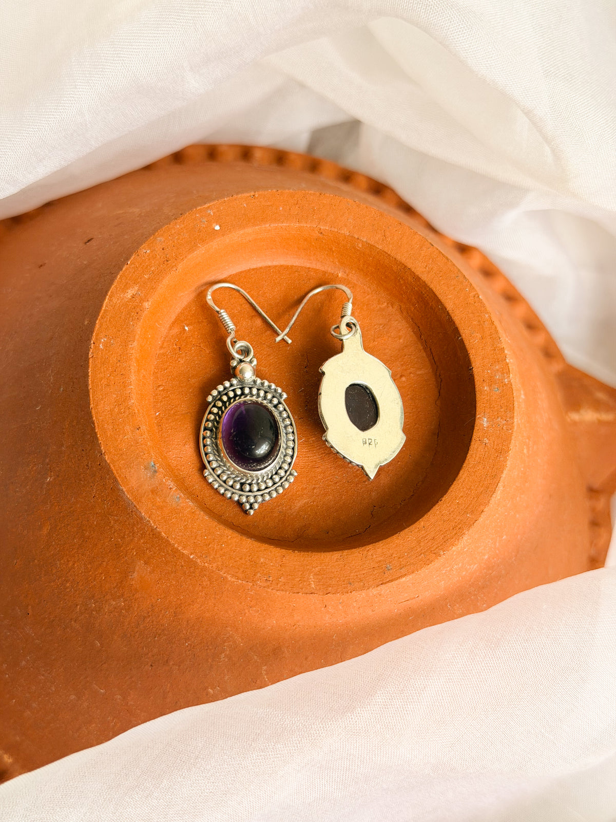 Angoori fish hooks in silver with amethyst stone