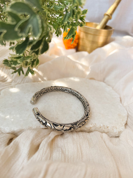 Mukula oxidised silver kada with carved details