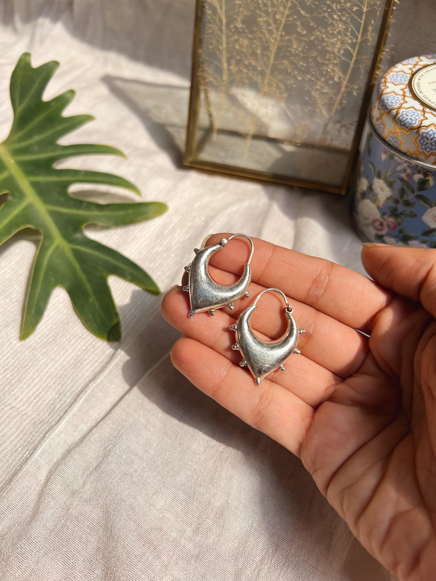 Unnati silver hoops with studding details