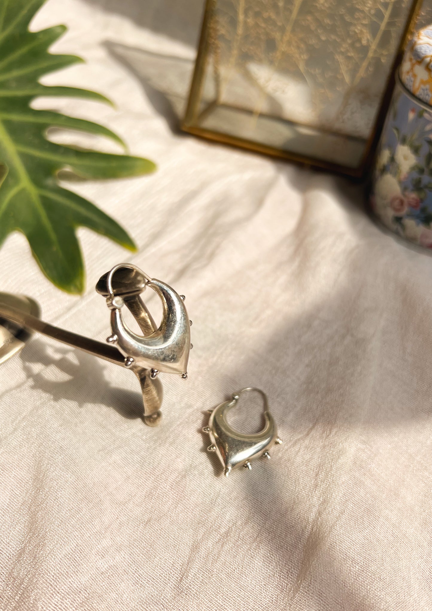 Unnati silver hoops with studding details