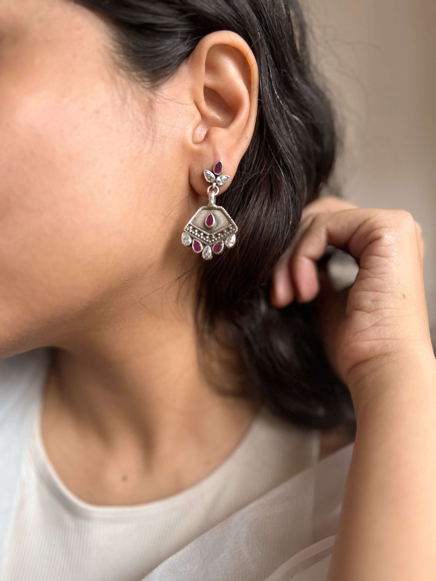 Agrata oxidised danglers in ruby pink and zircon stone