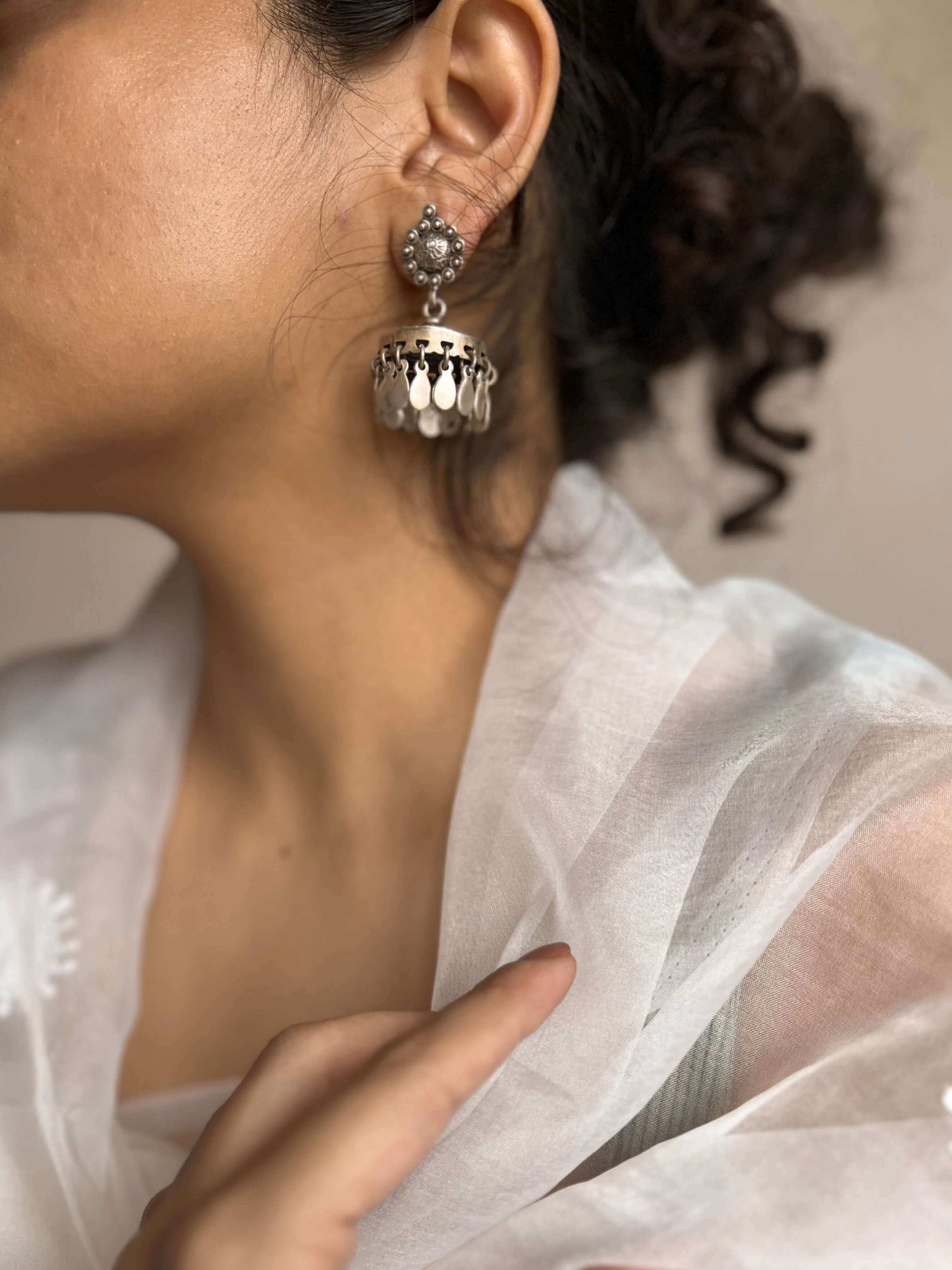 Aarya silver jhumka with leaf hanging detail