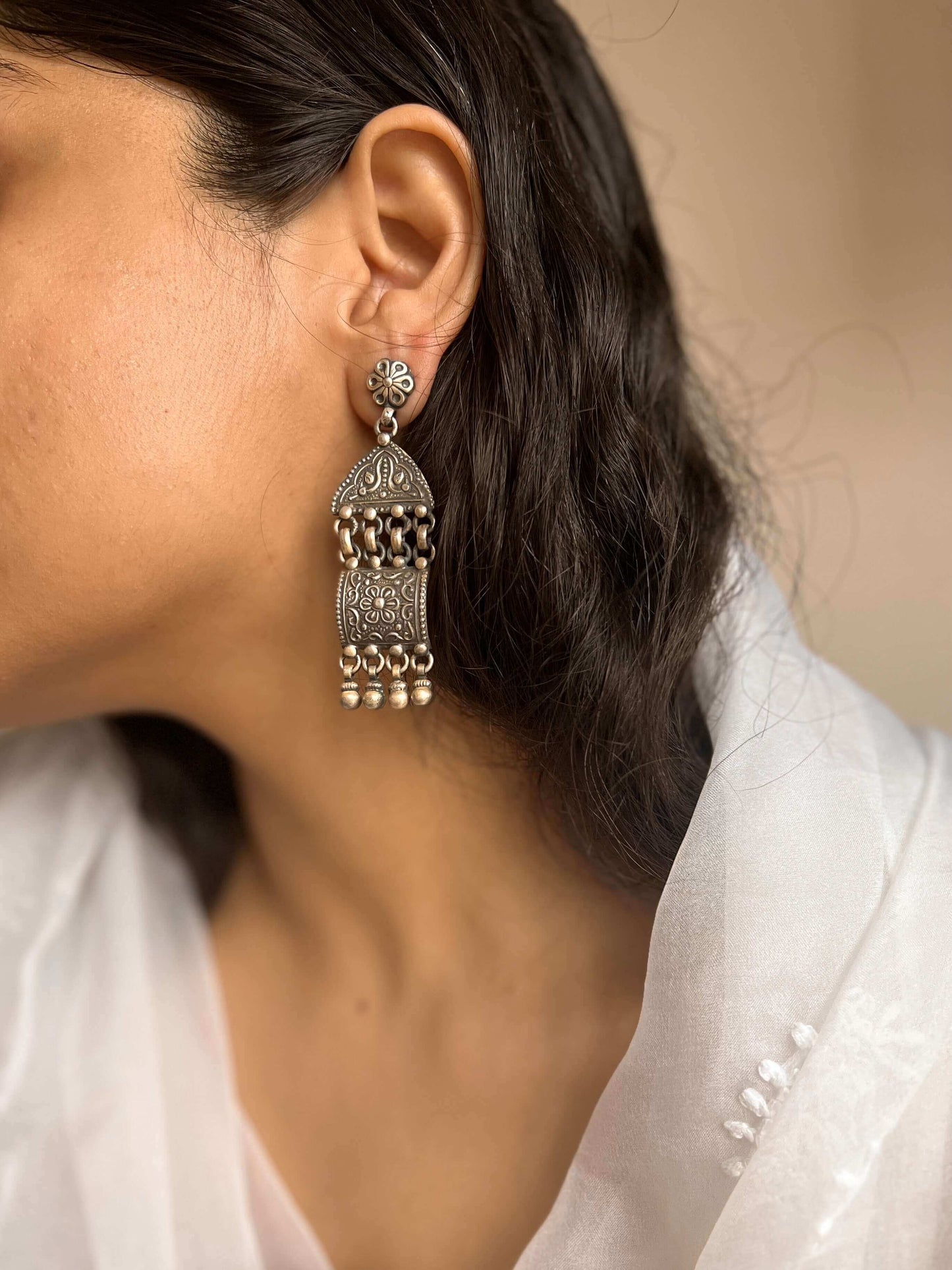 Aditri silver danglers with carved detail and silver beads