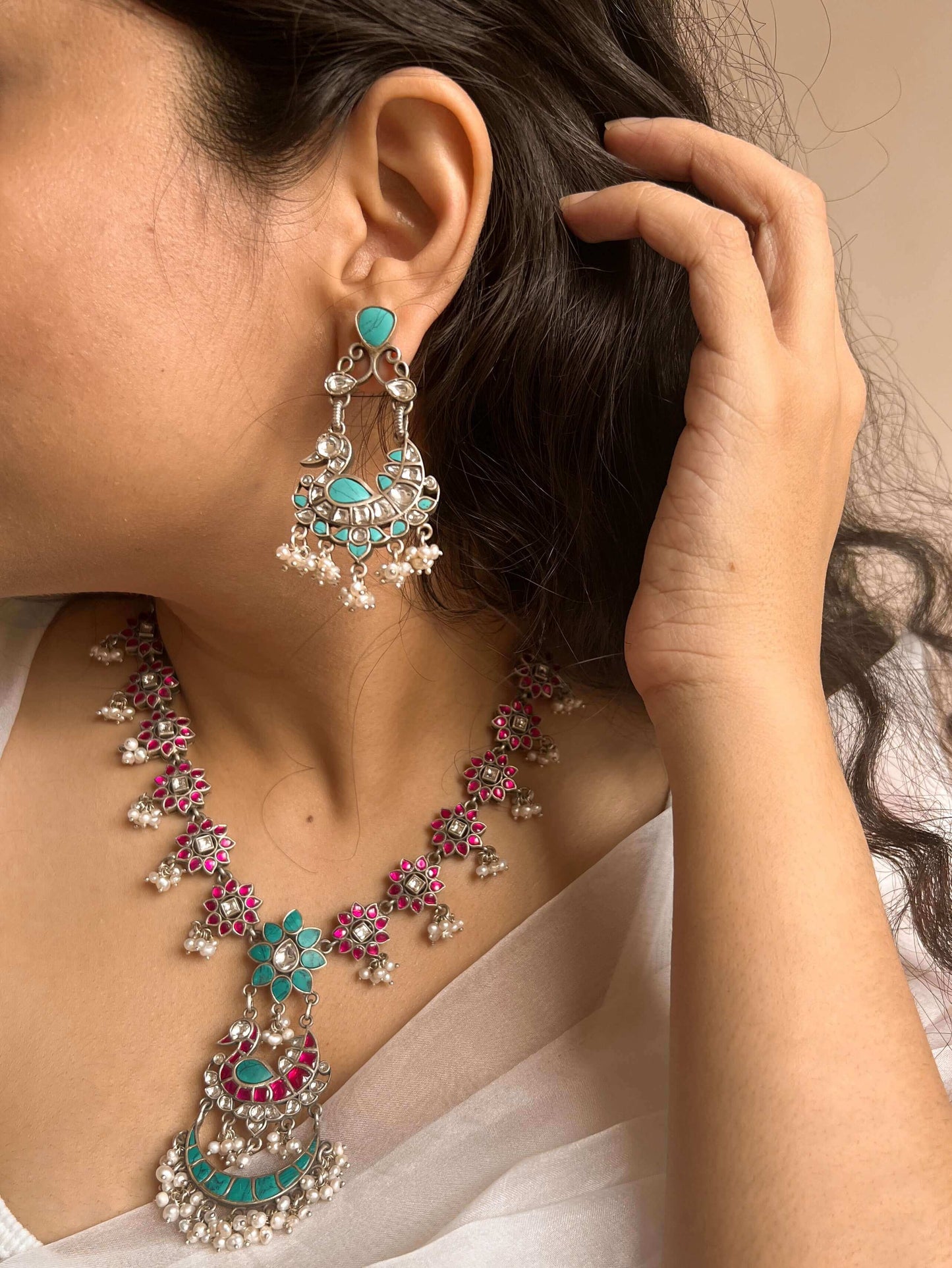 Samruddhi silver necklace set with turquoise and ruby pink kundan