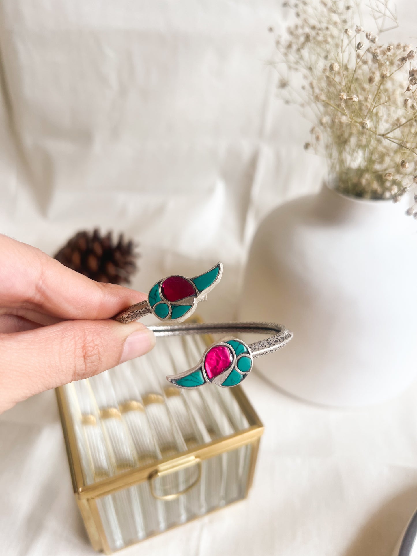 Toucan kada in silver with turquoise stone detail