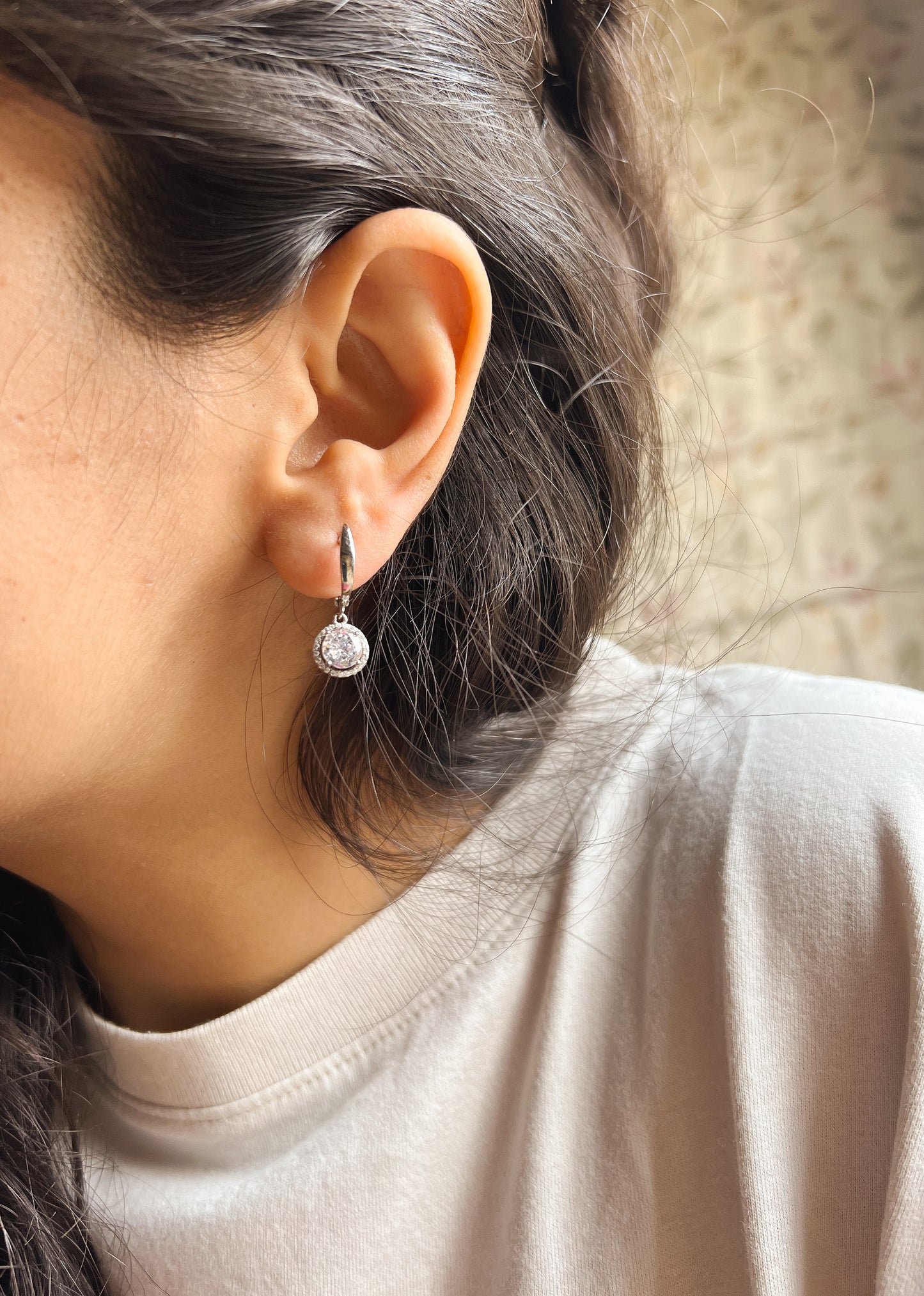 Aura mini danglers in silver with circle crystal charm