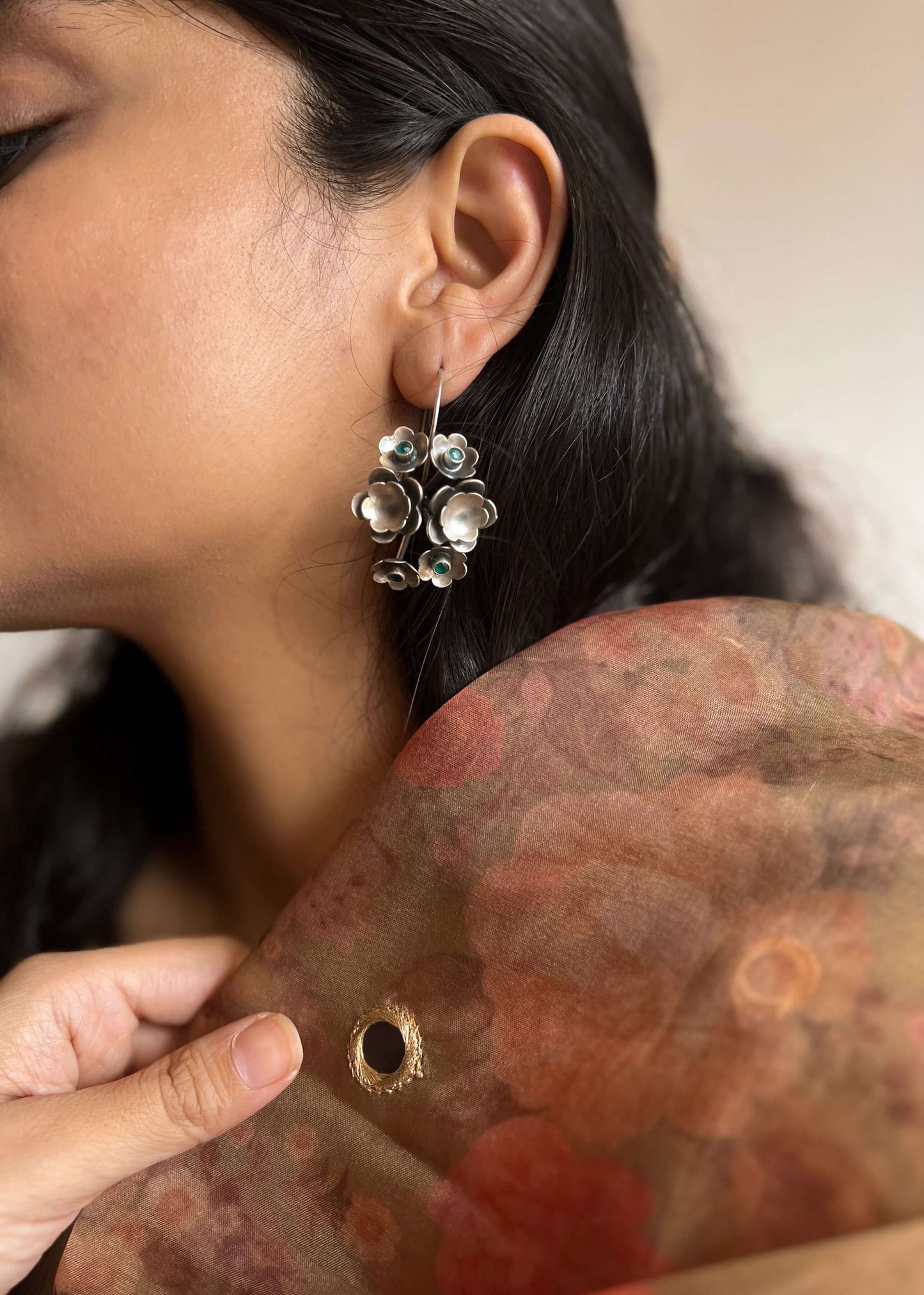 Keya oxidised silver flower earring with emerald green stone