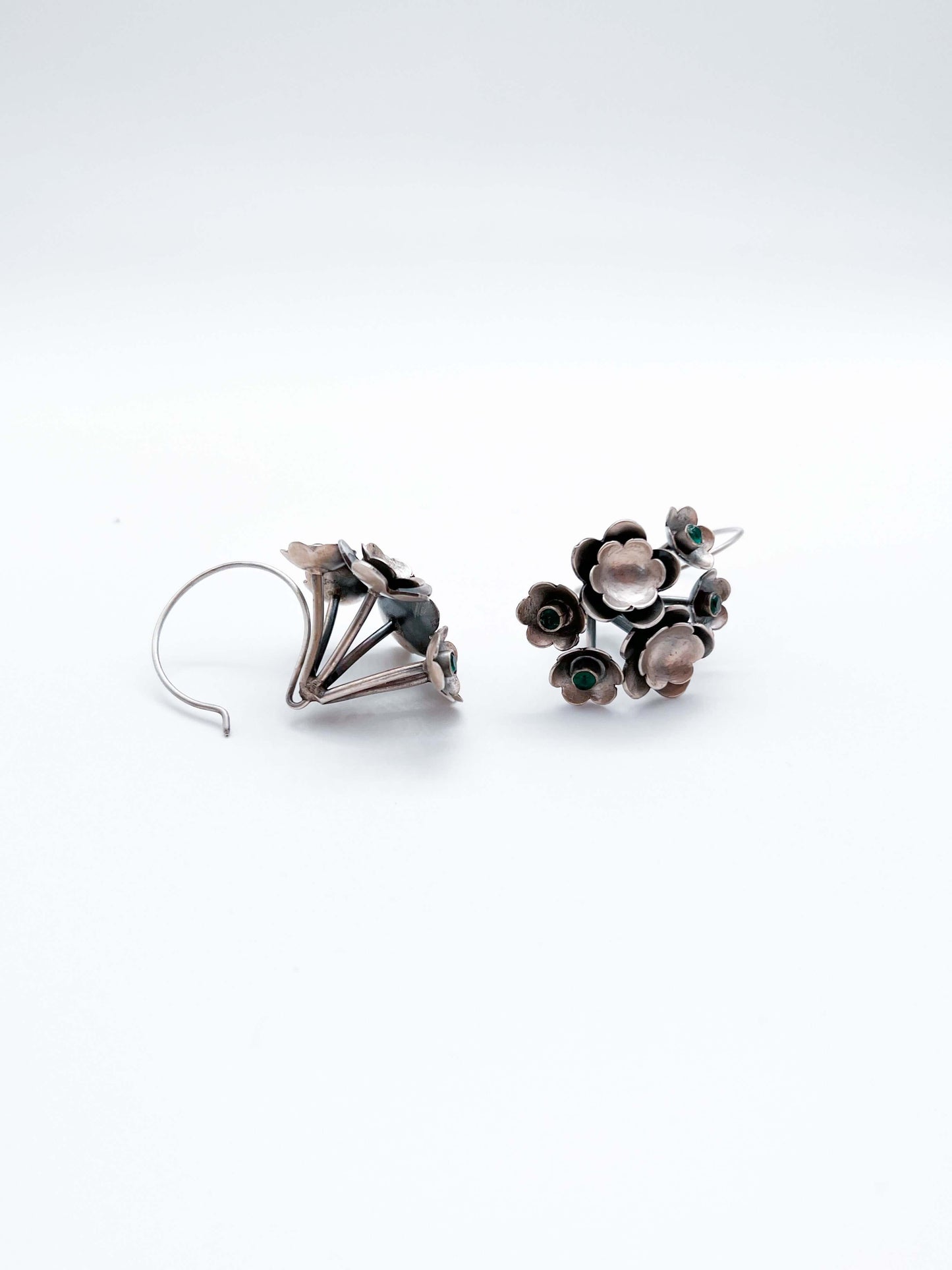 Keya oxidised silver flower earring with emerald green stone