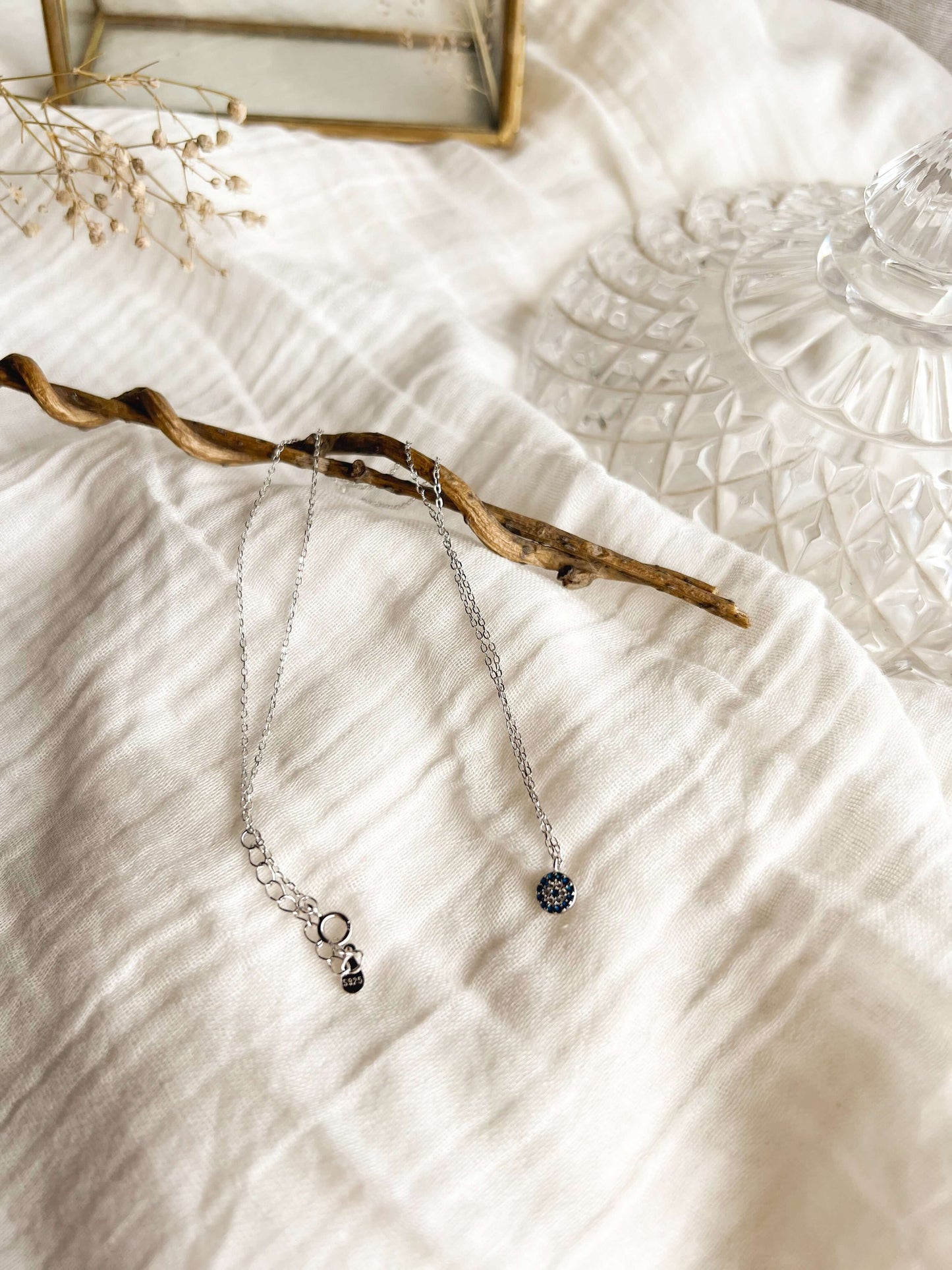 Evil eye silver necklace with crystals