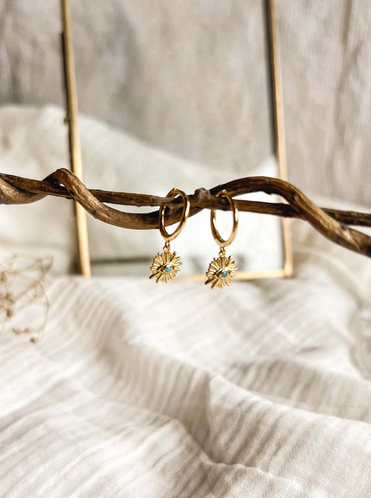 Evil eye starburst gold plated earring