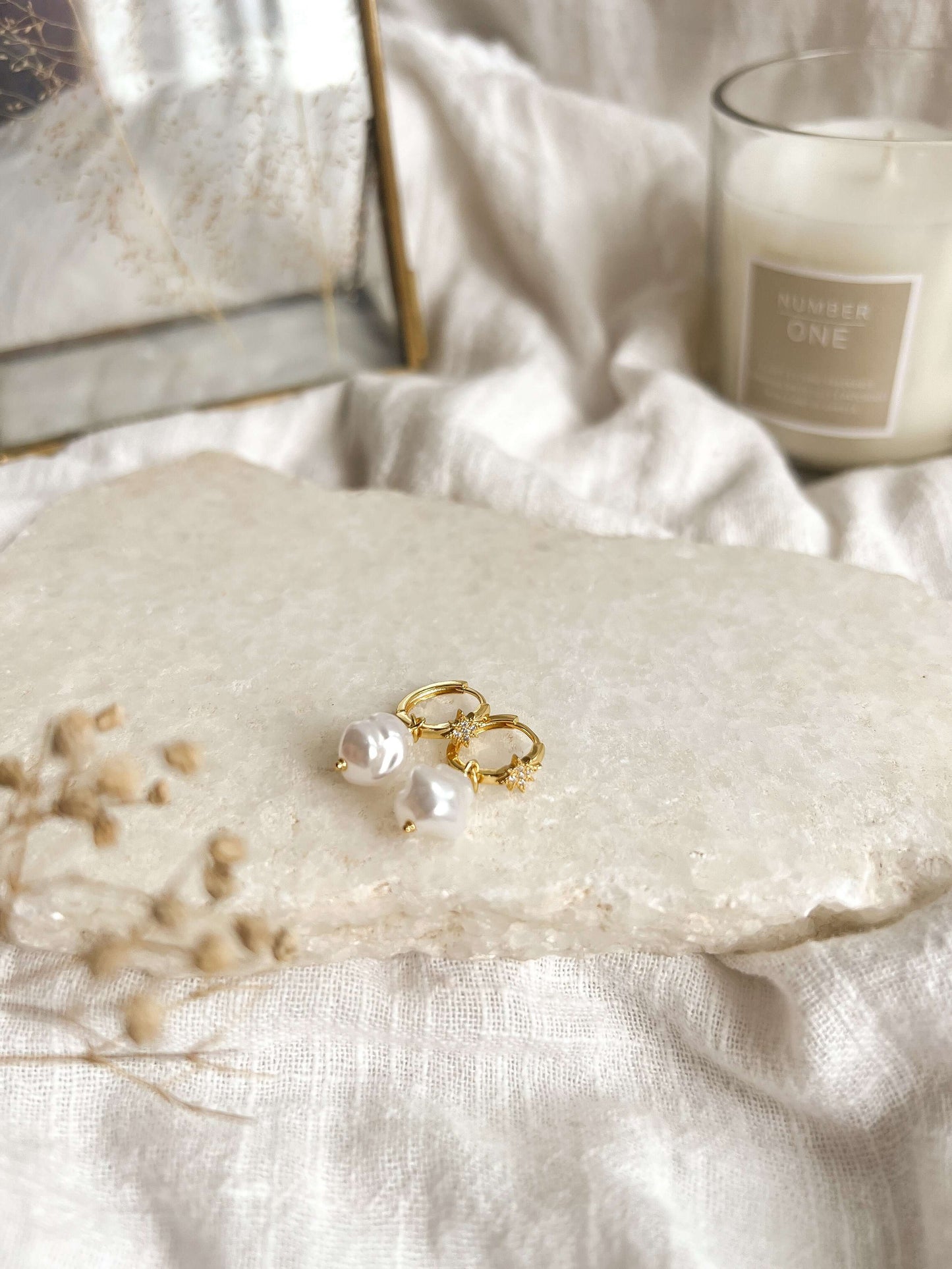 Abra huggies in gold plated sterling silver with baroque pearl