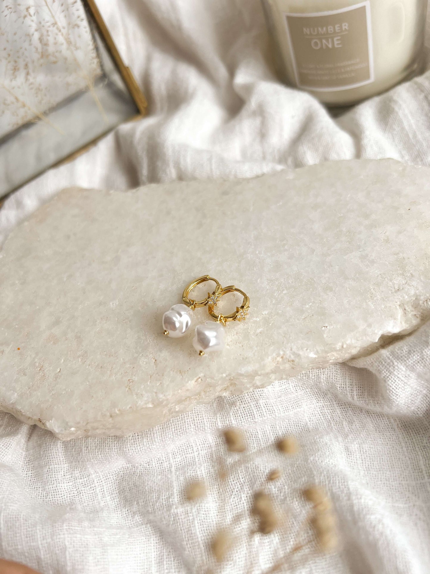 Abra huggies in gold plated sterling silver with baroque pearl