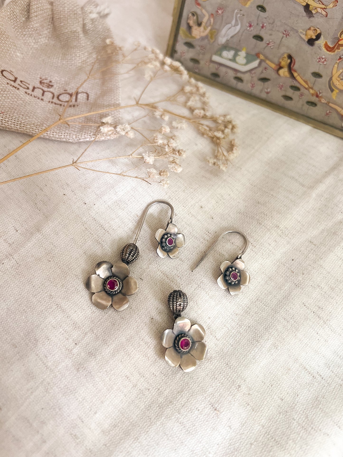 Nitara needle danglers with flower motifs