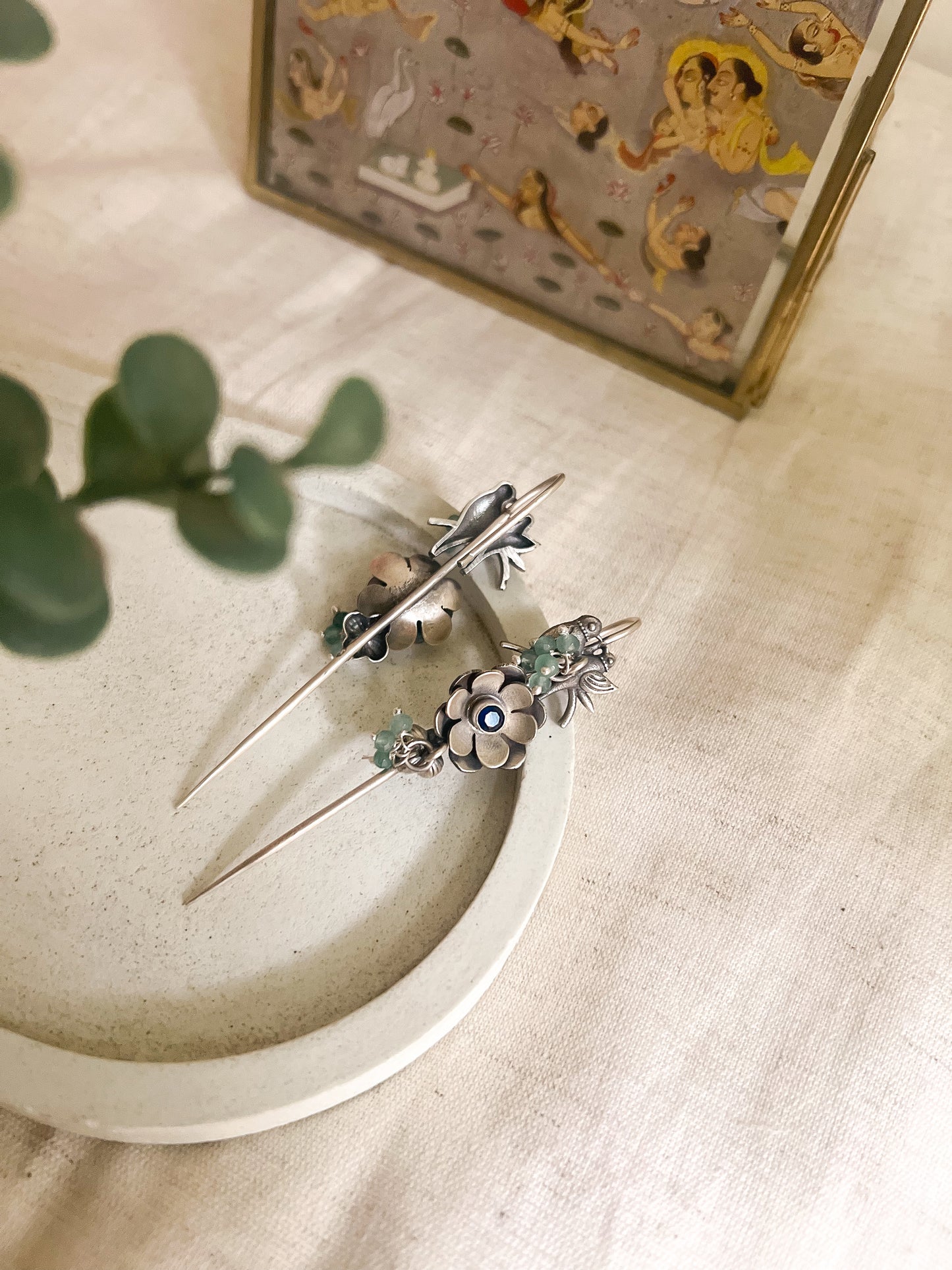 Keerat needle earcuff in silver with floral lovebird motif