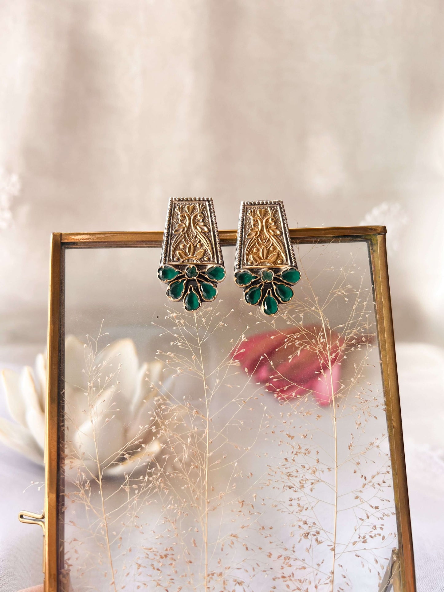 Mahira dual tone studs in silver with green onyx