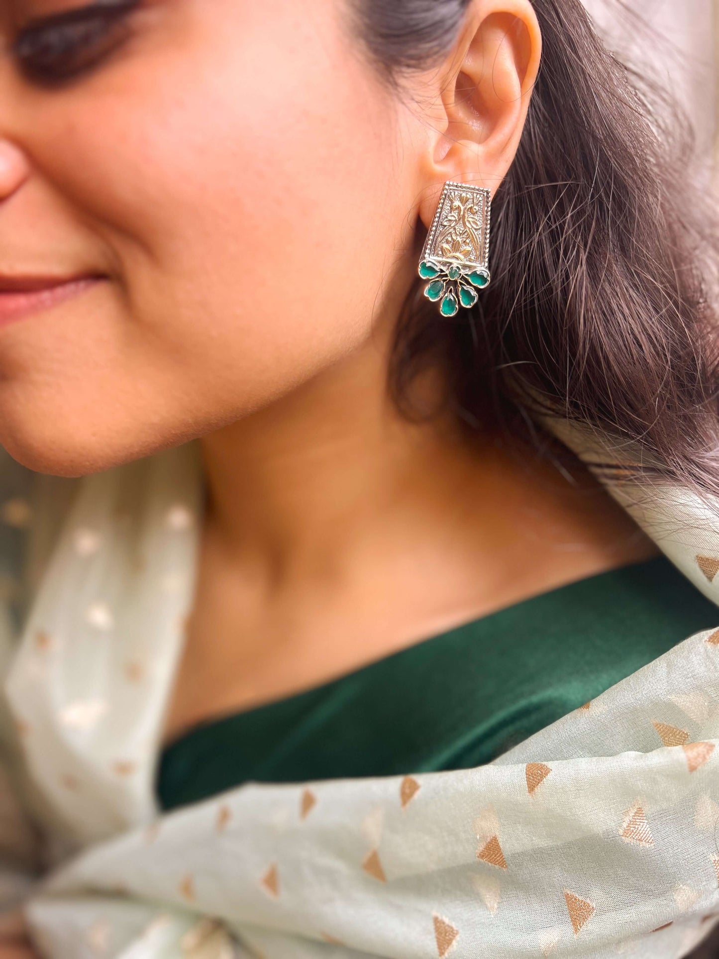Mahira dual tone studs in silver with green onyx