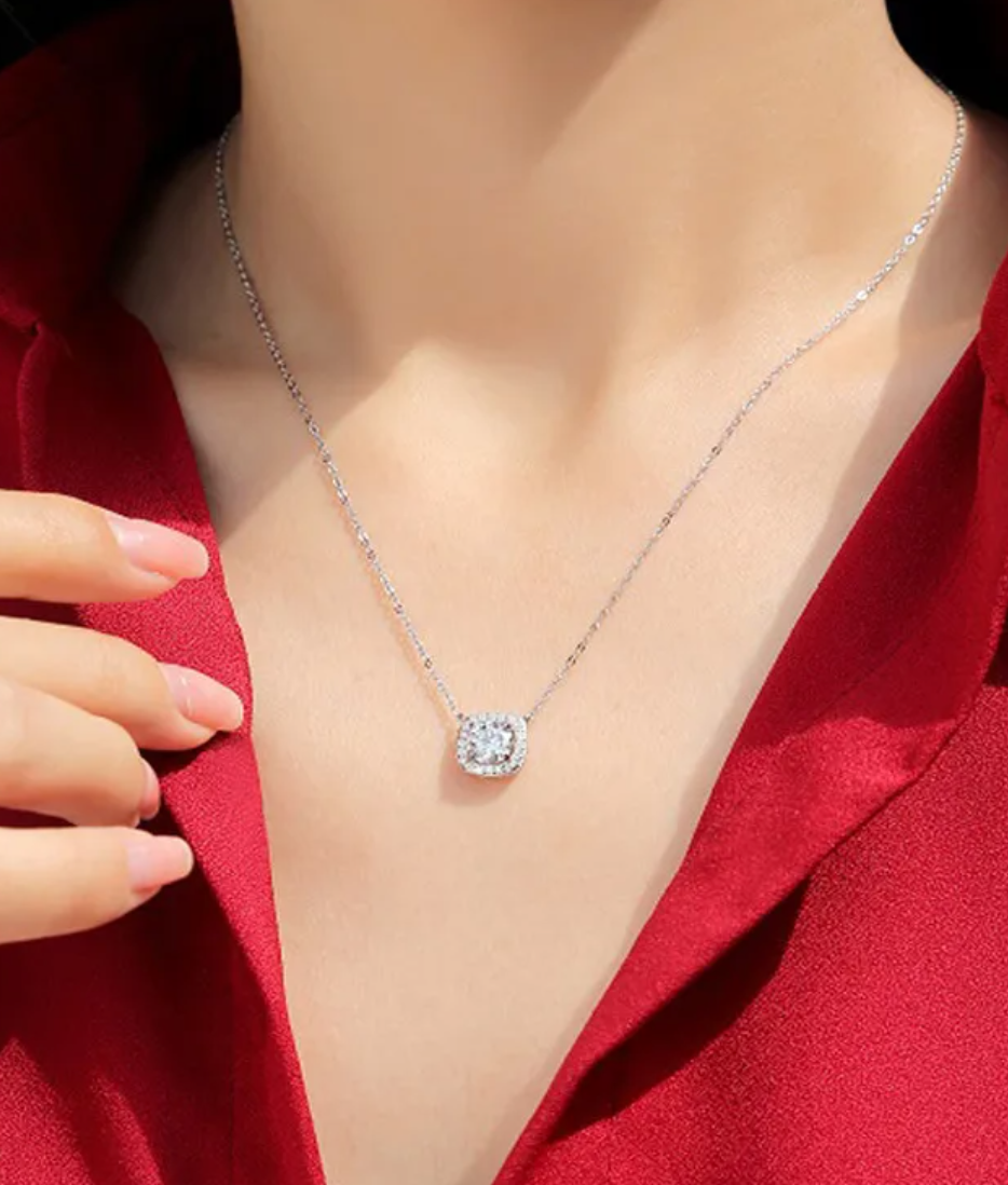 Cubic silver chain with zircon solitaire.