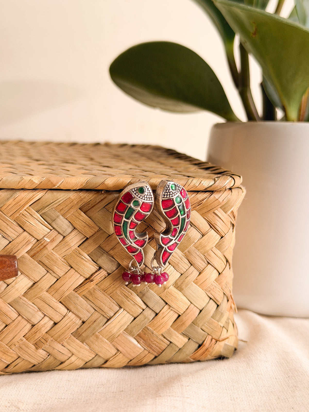 Meen studs in kundan carved in silver