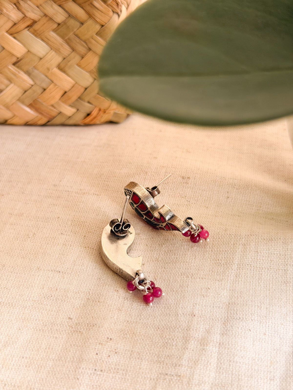 Meen studs in kundan carved in silver