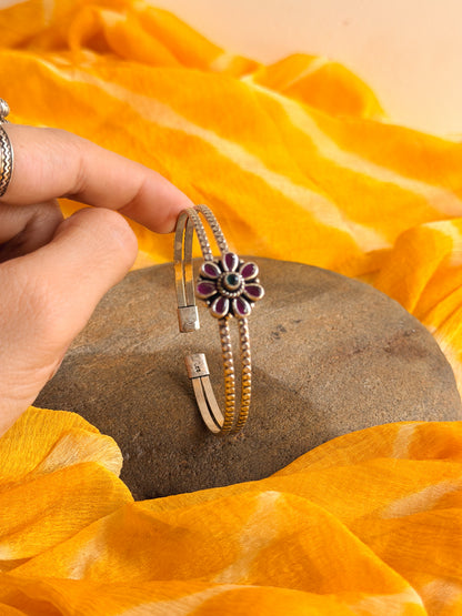 Kusum kada in silver with kundan detail in flower charm