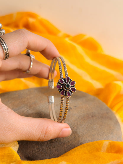 Kusum kada in silver with kundan detail in flower charm
