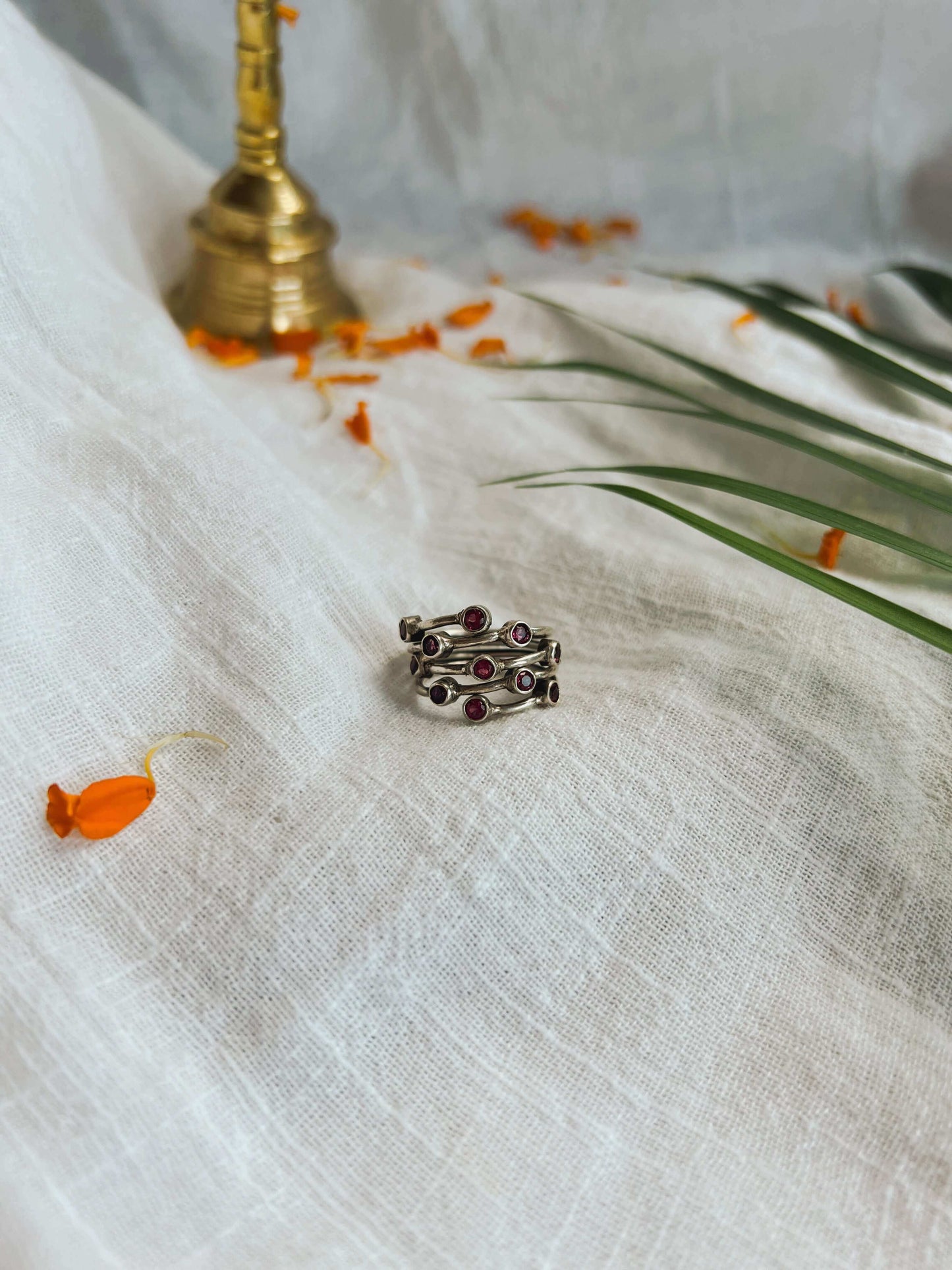Tara mandal ring with ruby glass stones