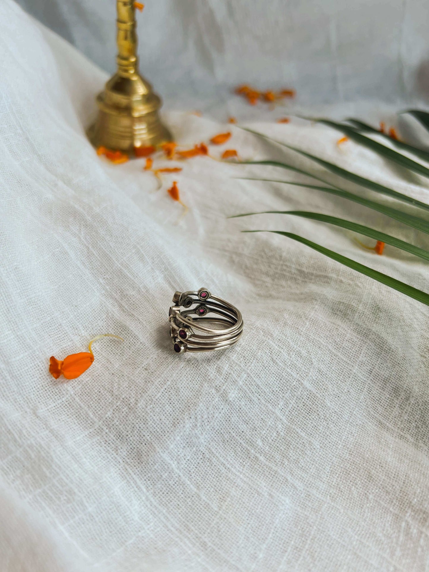 Tara mandal ring with ruby glass stones