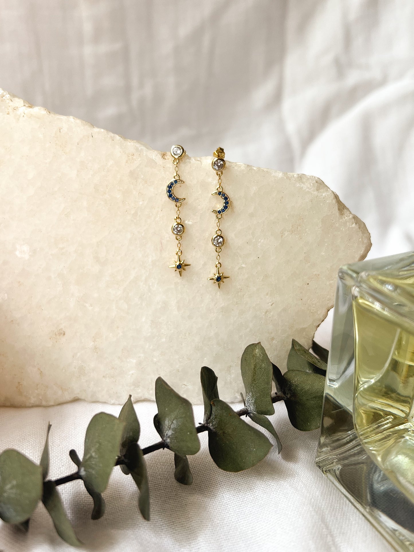 Astral moon and star gold plated danglers in sterling silver