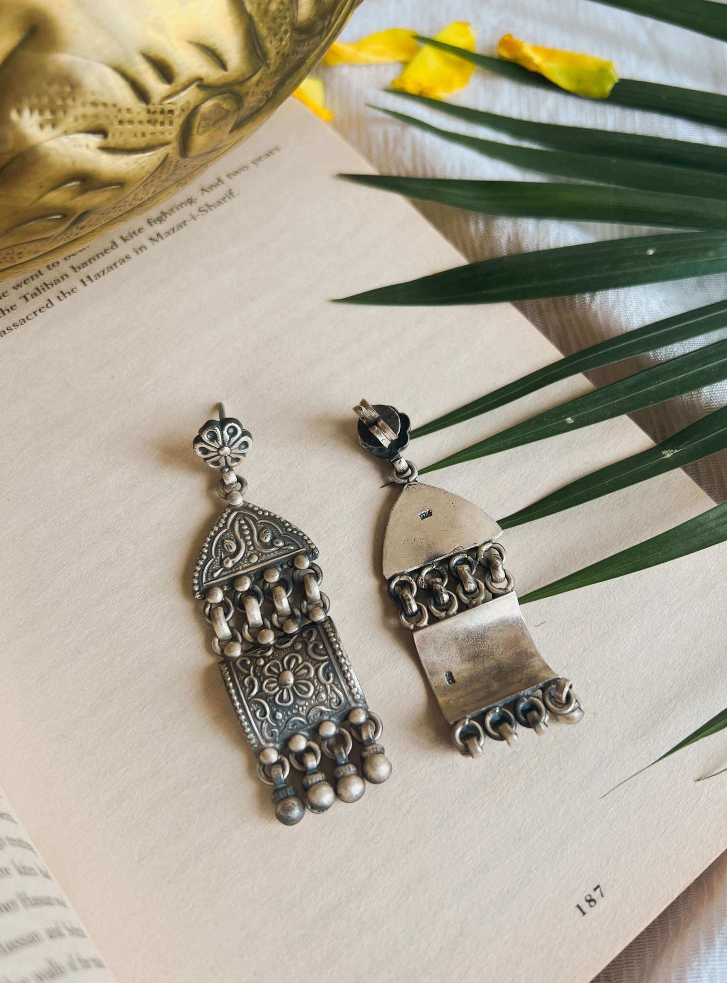 Aditri silver danglers with carved detail and silver beads