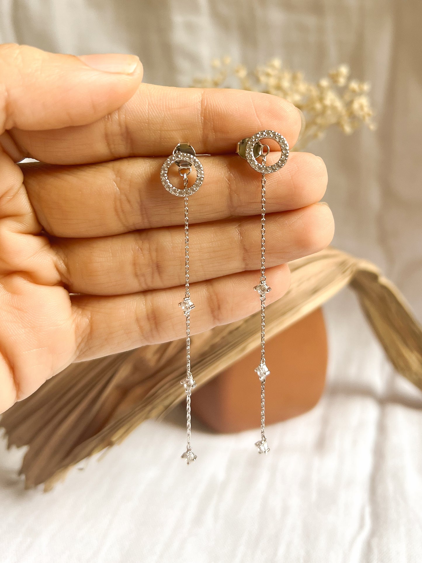 Orb long dangler with tassel in sterling silver and studded zircons