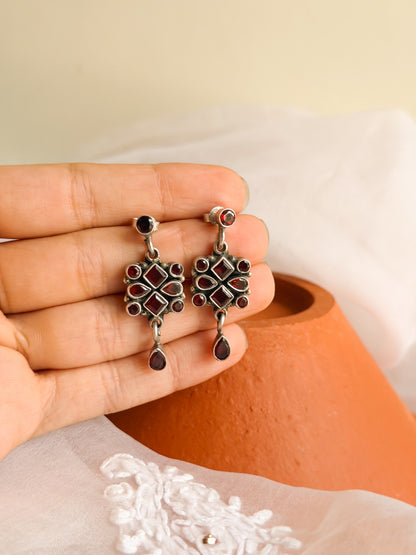 Surkh silver earrings with garnet stones