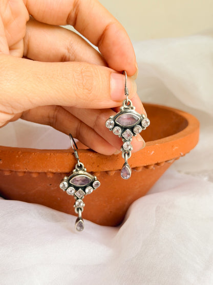Moksha fish hook earrings in sterling silver with amethyst stone