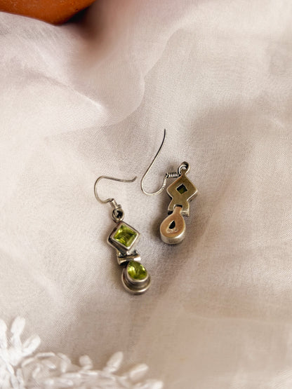 Kamya silver fish hook earrings in green peridot