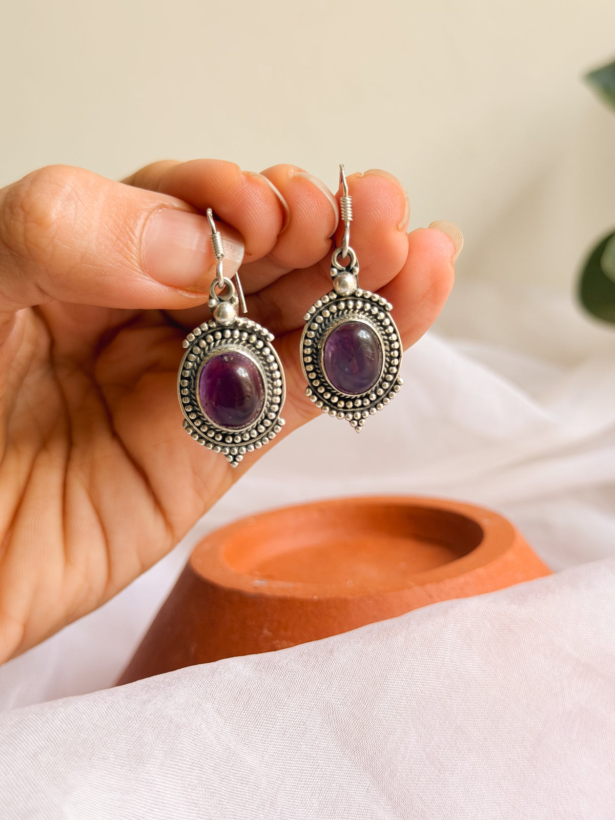 Angoori fish hooks in silver with amethyst stone