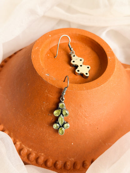 Bela silver danglers with green peridot stone