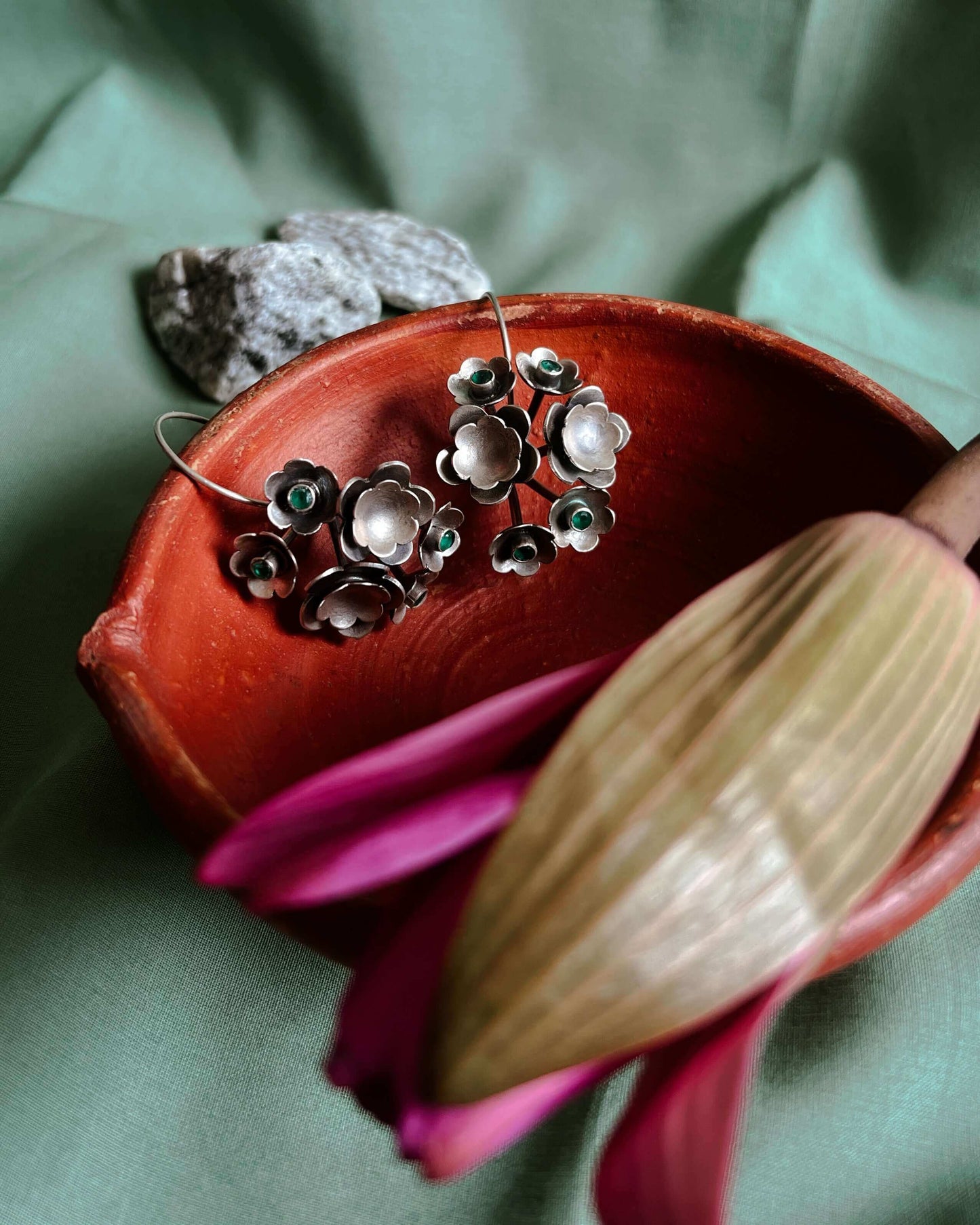 Keya oxidised silver flower earring with emerald green stone