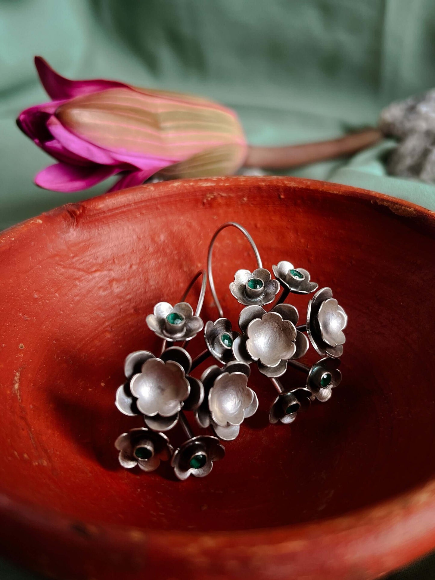 Keya oxidised silver flower earring with emerald green stone