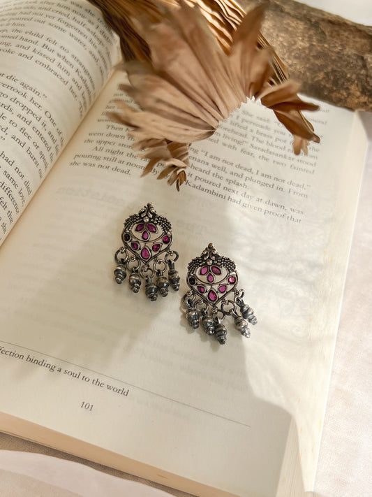 Alankriti oxidised silver earrings with red glass stones