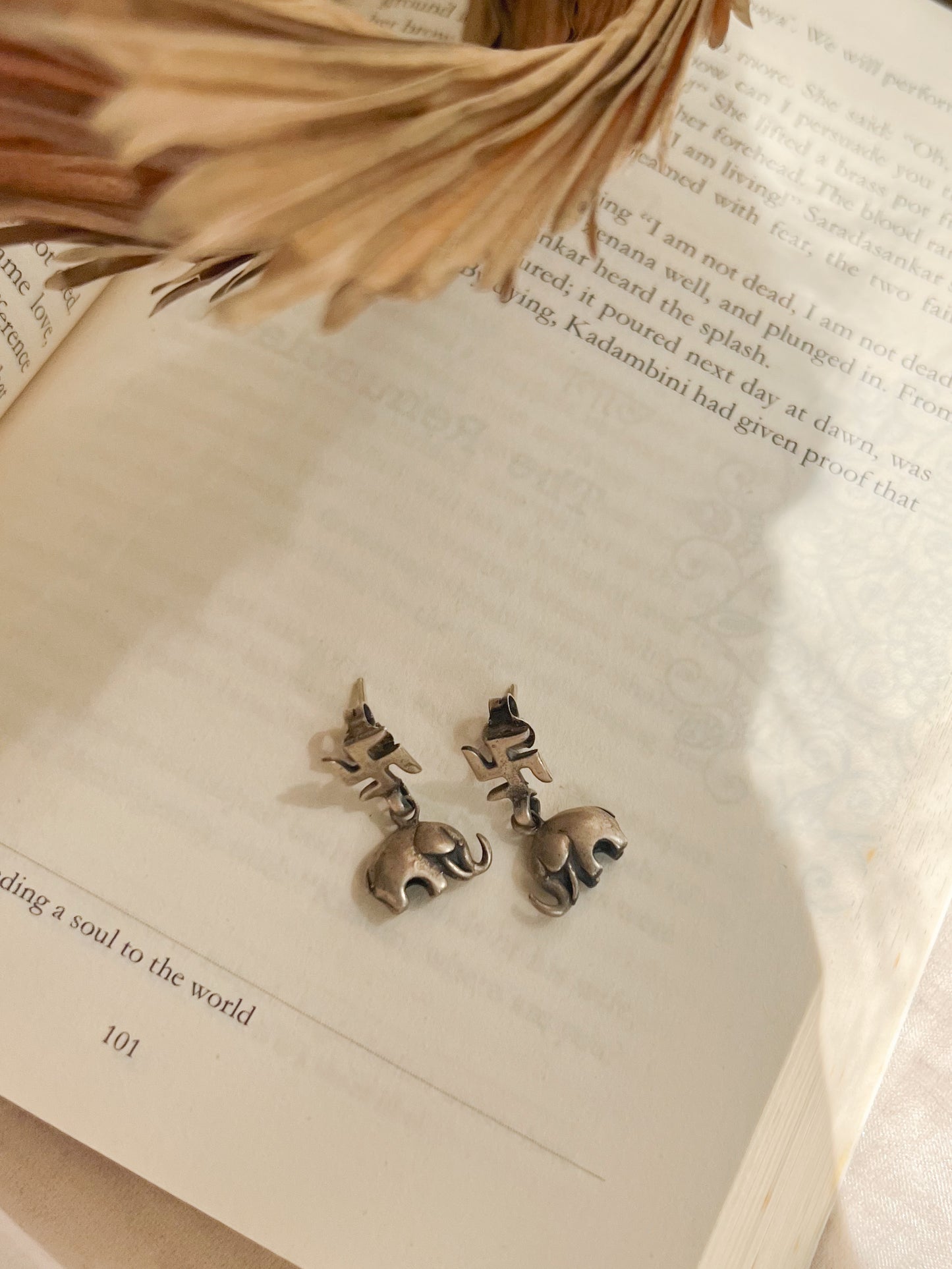 Swastika mini drops in silver with hathi charm