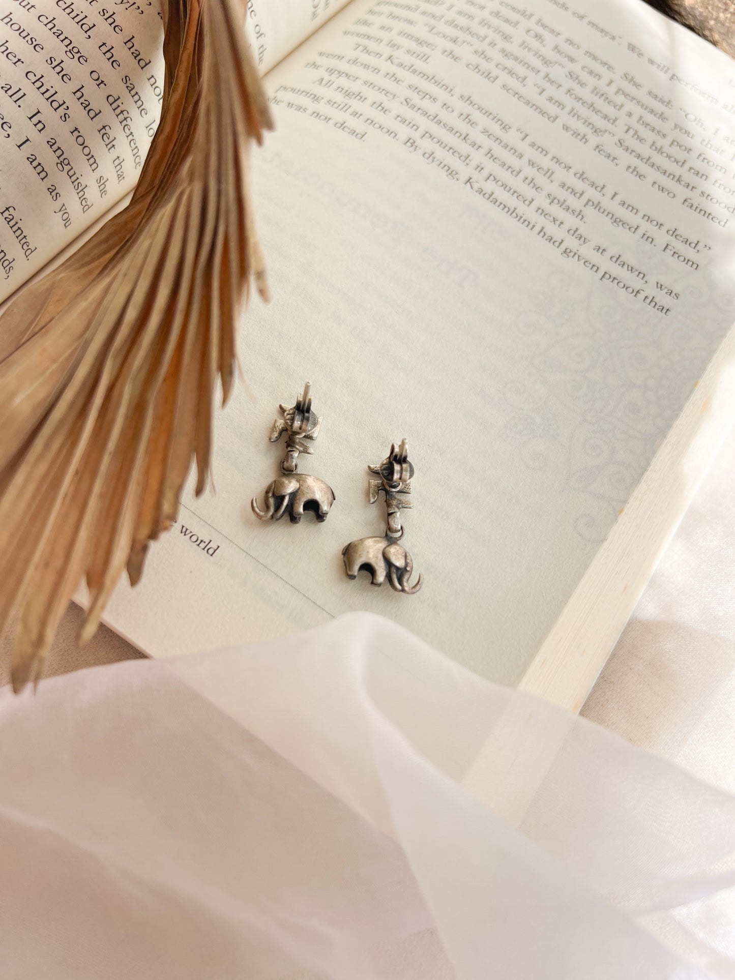 Swastika mini drops in silver with hathi charm
