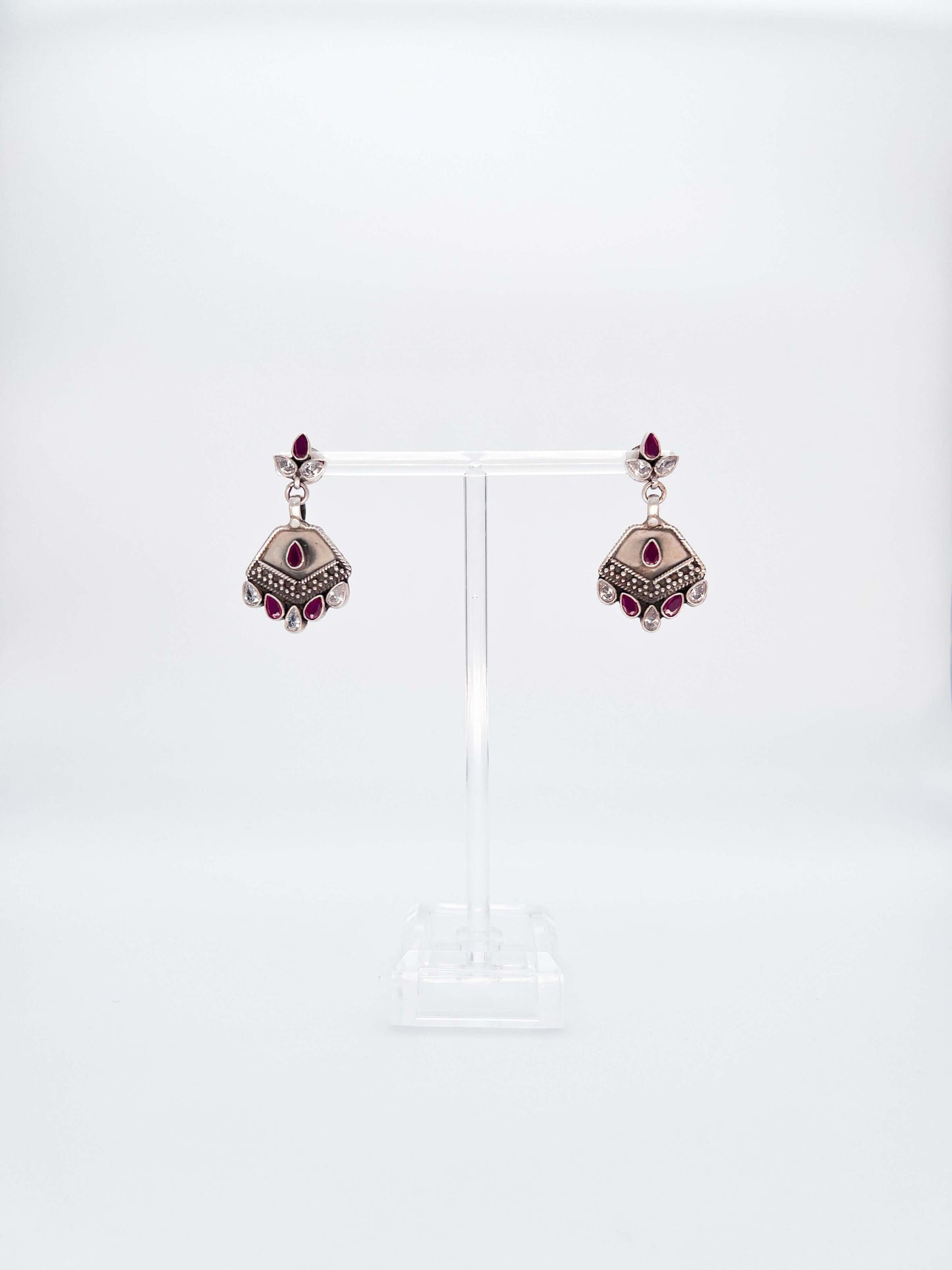 Agrata oxidised danglers in ruby pink and zircon stone