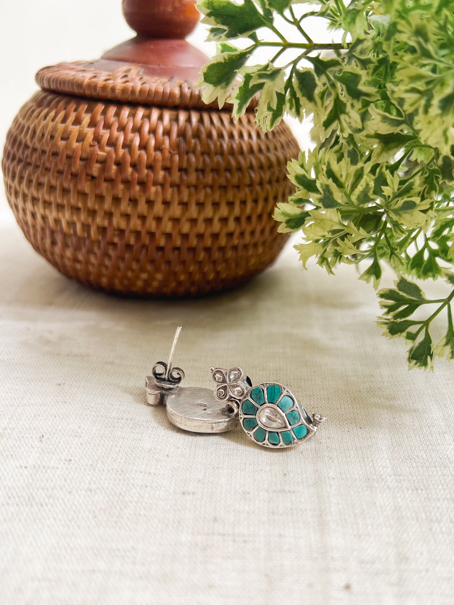 Buta studs in kundan with feroz detail crafted in silver