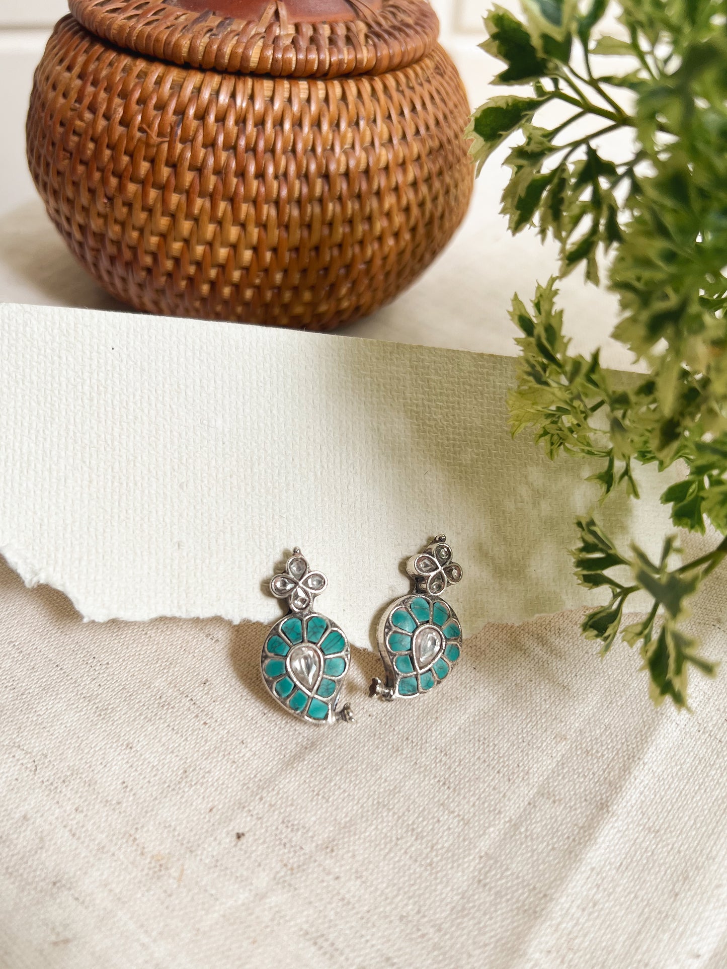Buta studs in kundan with feroz detail crafted in silver