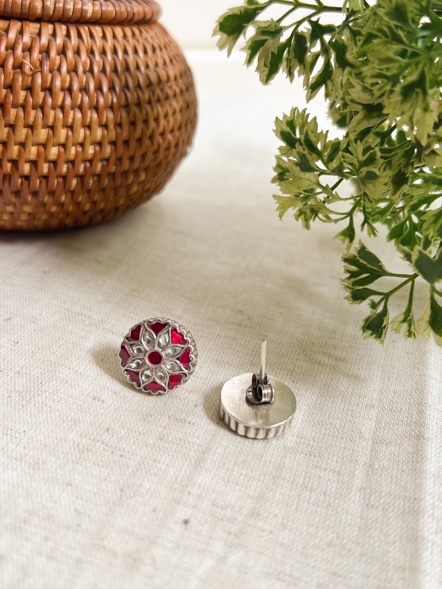 Phool studs in kundan carved in silver